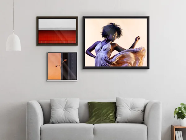 PDP | HD Metal Print | Images Text Section > Frames | Media #1 Several different motifs on an HD Metal Print with different frames hang on a wall in a living room.