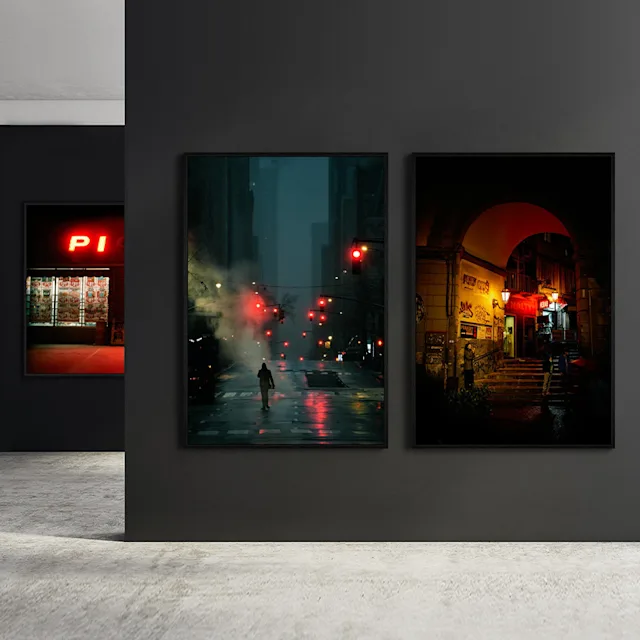 Shopify | Product Grid Section | B2B Kachel Three framed photos with night scenes on dark walls in a photo exhibition