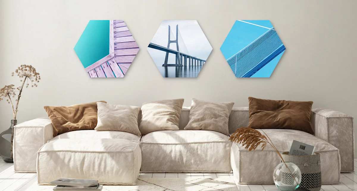 PDP | Round Format & Shapes | Big Picture Slider Section > Hexagon | Slide #1 | Media #1 3 different motifs in hexagon format are hung next to each other on a wall.