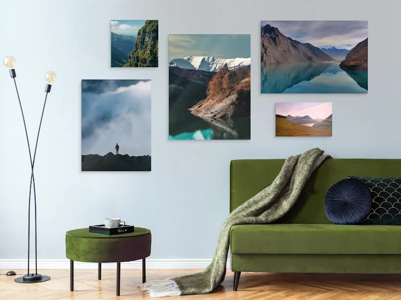 Photo Print On Aluminum Backing Several different motifs on a Photo Print On Aluminum Backing hang on a wall in a living room.