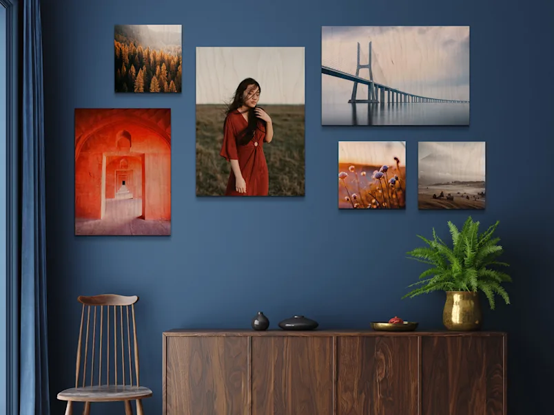 PDP | Direct Print on Wood | Product Selector Section | Media #4 Several different motifs on Direct Print On Wood on a wall in a living room.