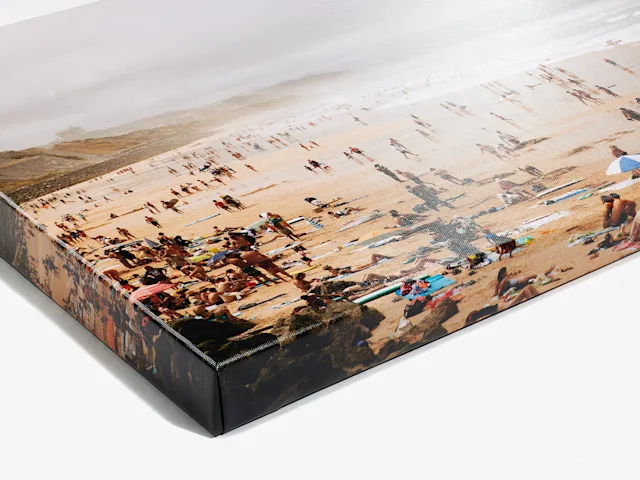 PDP | Glossy Canvas On Stretcher Frame | Product Selector Section | Media #2 Close up of a beach as a glossy canvas print on a stretcher frame.