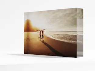 Acrylic Photo Block Acrylic block print on stand with image of a surfer.