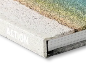 Corner view of a coffee table book with a matt cover